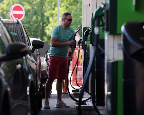 A customer refuels a vehicle at a petrol station in Buckinghamshire, northwest of London, Britain, 01 August 2026