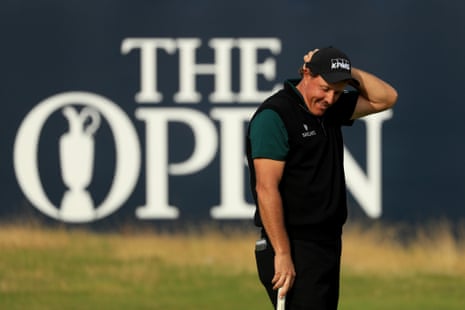 Phil Mickelson reacts after his birdie putt narrowly missed on the 18th.