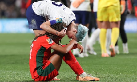 United States’ Megan Rapinoe consoles Portugal’s Jessica Silva after the full-time whistle.