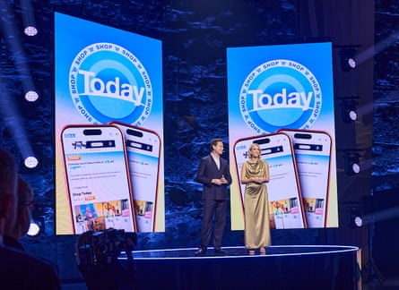 The presenters on a stage in front of screens showing the Today logo above mobile phones