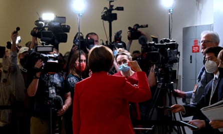 Senator Amy Klobuchar talks with the media as she arrives for Tuesday’s hearing.