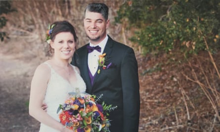 bride and groom on their wedding day. bride holds bouquet of colourful flowers