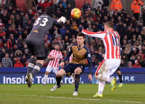 Cech punches the ball away from Arnautovic.
