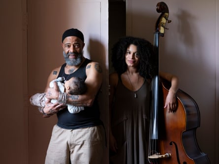 Patrick with his partner Sélène Saint Aimé and their baby daughter