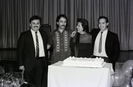 GLLU’s fourth anniversary dinner, with the members David Gonzales, Laura Esquivel and Roland Palencia posing with a cake, in November 1985.
