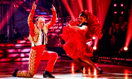 McCausland and his dance partner Dianne Buswell, who are dressed in red, perform a paso doble.