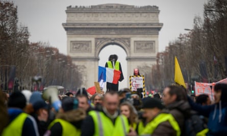 Yellow vest protestors near the Arc de Triomphe in Paris, France.