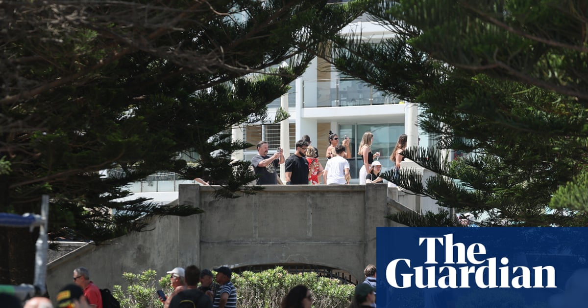 ‘I knew I had to come here’: emotional scenes as footbridge used to carry out Bondi terror attack reopens