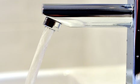 Water flowing from a sink tap
