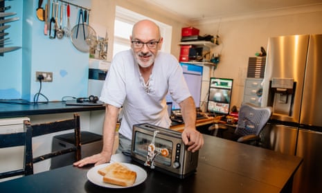 Portrait of inventor Philip Davies and his Artificial Intelligence powered toaster.