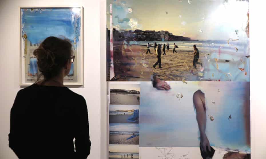 A patron looking at Rob Cleworth’s artwork which explores the police shooting of Roni Levi on Bondi beach, showing as part of the justiceINjustice exhibition – a collaboration between artists and lawyers.