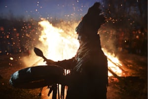 A shaman conducts a sacred fire-lighting rite in Tyva, Russia