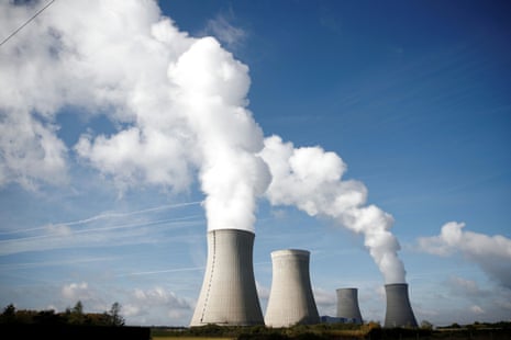 Steam rises from cooling towers of a nuclear power station in France