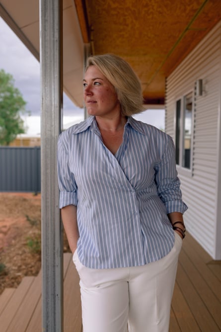 Heather Stennett standing outside a house