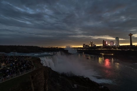 People gather to watch totality in Niagara Falls, New York.