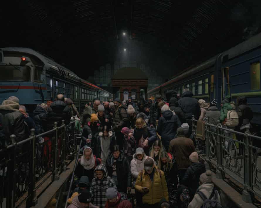 Internally displaced people from Sumy arrive at the main railway station in Lviv, 9 March