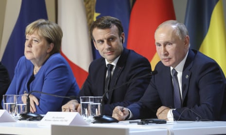 Angela Merkel, Emmanuel Macron, left and centre, have sugggested an EU summit with Russian president Vladimir Putin. 