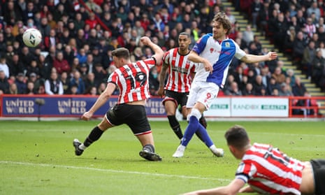 Sam Gallagher’s shot hits Jack Robinson on the hand on its way to goal.