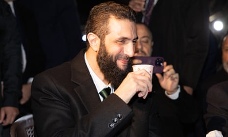 Ahmed al-Sharaa watches the view of Damascus on Mount Qasioun in Syria on 22 December 2024.