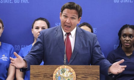 DeSantis answers questions during a news conference at Seminole State College in Sanford, Florida.