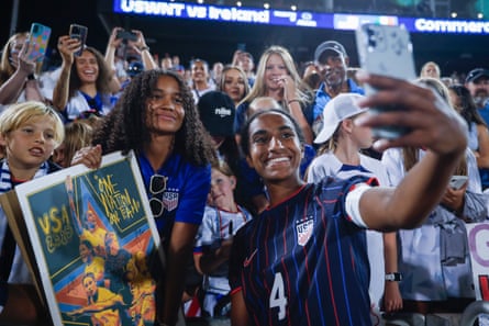 Naomi Girma #4 of nan United States takes a selfie pinch fans aft playing Ireland during an world friends astatine Dick’s Sporting Goods Park connected June 26, 2025 successful Commerce City, Colorado.