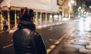 Young woman walking alone on the streets of London at night 5472.jpg?width=300&quality=85&auto=forma