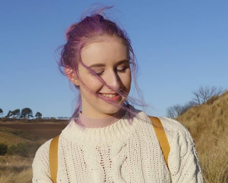 Rachel Keenan has purple hair in a picture taken in 2018.