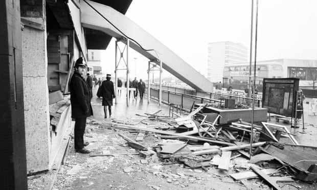 A policeman standing outside the Mulberry Bush the day after the explosion in Birmingham City centre.