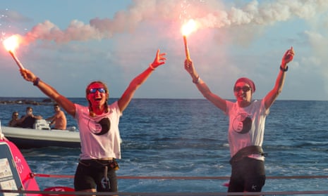Sara Brewer (right), and her rowing partner Ann Prestidge celebrate after crossing the Atlantic in 86 days