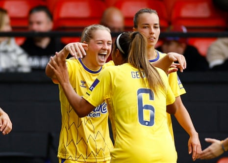 Lucy Graham and Gabrielle George celebrate Everton’s winner against Aston Villa.