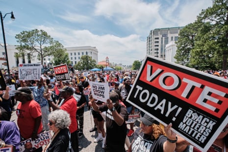 ‘They may draw racist maps, but we are the south’: thousands rally in Alabama for Black voting rights - The Guardian