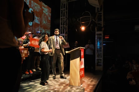 People on a stage with a podium