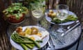 Fresh asparagus with young boiled potatoes, fried egg and glass of white wine. A delicious summer vegetarian meal: fresh asparagus with young boiled potatoes, fried egg and glass of white wine. Yum.