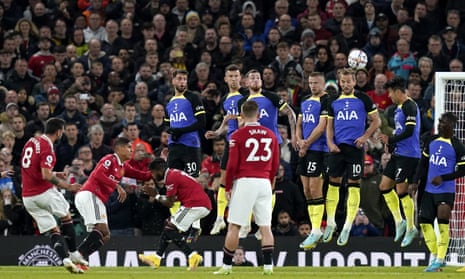 Bruno Fernandes (left) of Manchester United takes a free-kick.