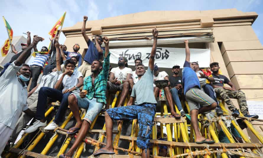 Protesters shout slogans during the day and night protest in front of the Presidential Secretariat in Colombo, Sri Lanka, on 18 April 2022.