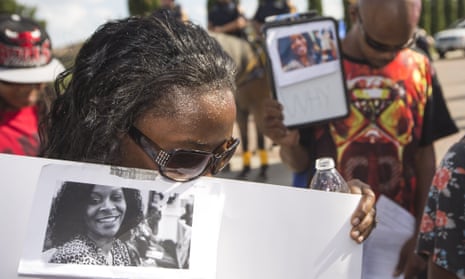 Margaret Hilaire bows her head in prayer during a demonstration in Katy, Texas, in 2015, after Sandra Bland’s death.
