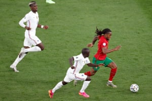 Portugal’s Renato Sanches (right) is chased by France’s N’Golo Kante.