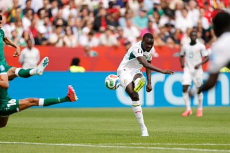 Pape Gueye fires home Senegal’s third goal against Iraq.
