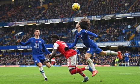 Bukayo Saka under pressure from Marc Cucurella.