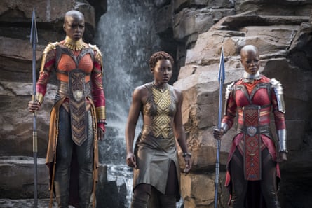 Danai Gurira, Lupita Nyong’o, Florence Kasumba wearing Carter costumes in Black Panther.