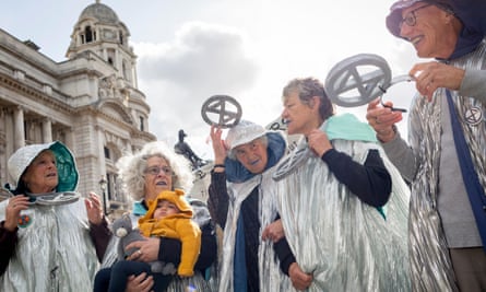 Older environmental activists protest about climate change in London.