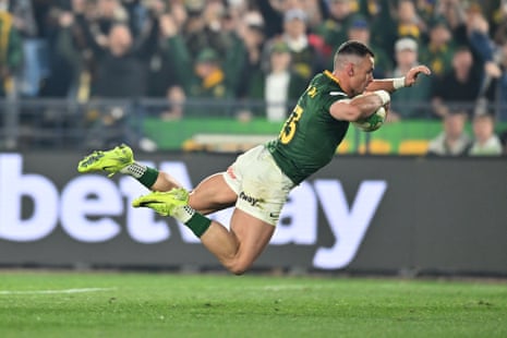 Jesse Kriel of South Africa scores their team’s sixth try.