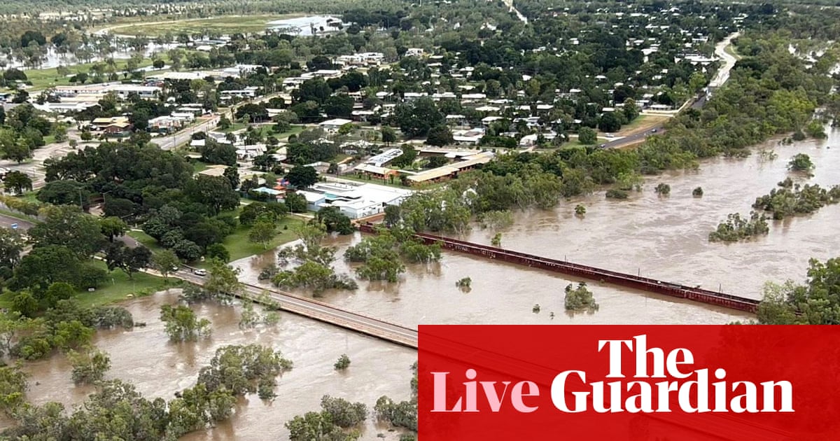 Australia news live: entire town of Daly River evacuated with flood waters to rise as NT residents warned ‘crocs absolutely everywhere’