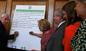 Labour's John McDonnell, with Anna Soubry, Ian Blackford, Jo Swinson and Liz Saville Roberts, signs a cross-party declaration against a non-deal Brexit at Church House.