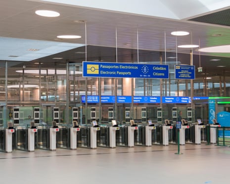 Passenger electronic passport control check gates: desks for checking passengers at Lisbon Portela Airport.