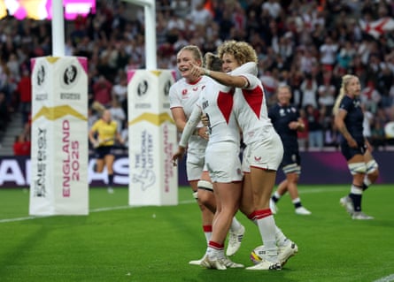 Ellie Kildunne celebrates with Abby Dow after scoring England’s fourth try in their 69-7 mauling of USA.