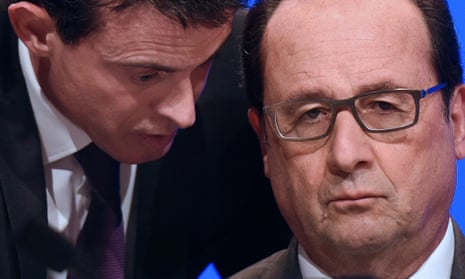 The French prime minister, Manuel Valls, speaks to President François Hollande.