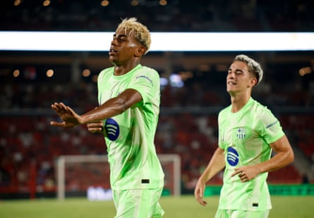 Lamine Yamal celebrates after completing the scoring.