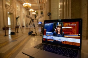 A laptop at Stormont showing Nichola Mallon speaking in the debate.