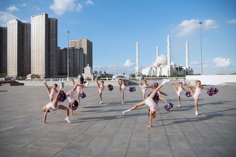 Junior members of Kazakhstan’s Cheer Republic team perform in Independence Square, Astana, in front of the Hazrat Sultan mosque.